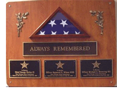 Photo of police memorial wall display at West Chicago City Hall