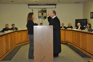City official getting sworn in by judge