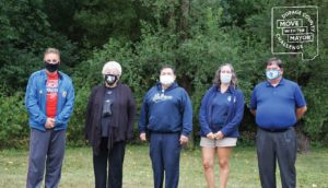 Several DuPage Mayors and Village Presidents standing with masks
